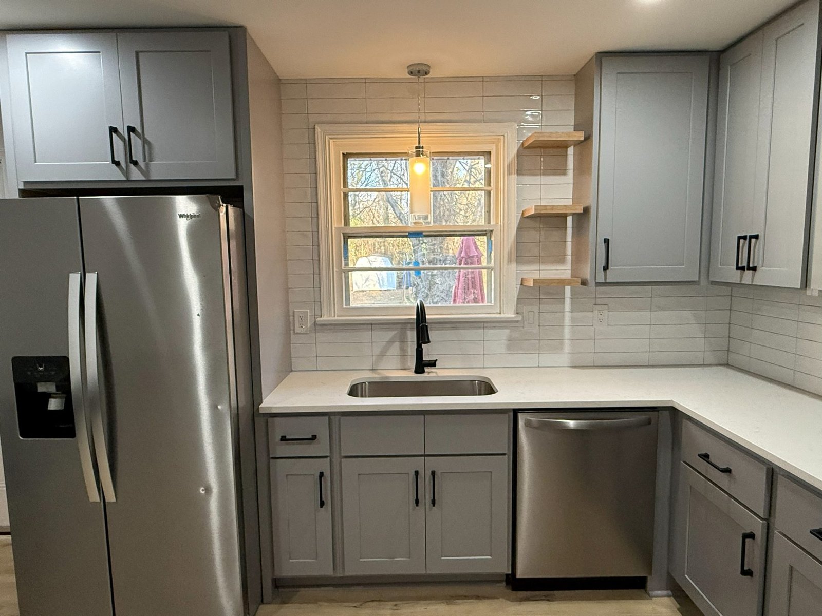 Kitchen remodeled by Yahweh Contractors, view toward the window