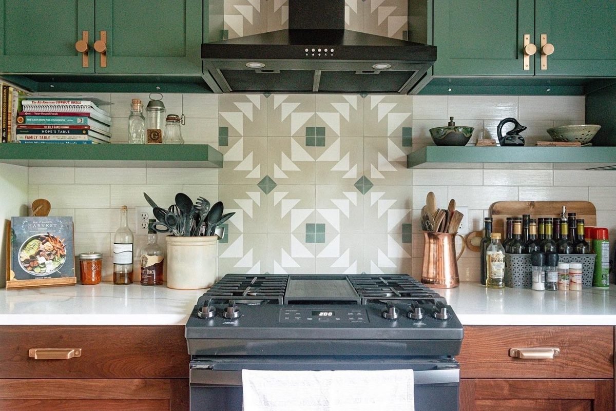 Green kitchen with tile backsplash